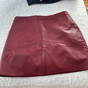 Lulus red leather like mini skirt lined, approx 15” long from waistband.